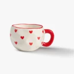 White Porcelain Mug with Pink Prints - Image 4