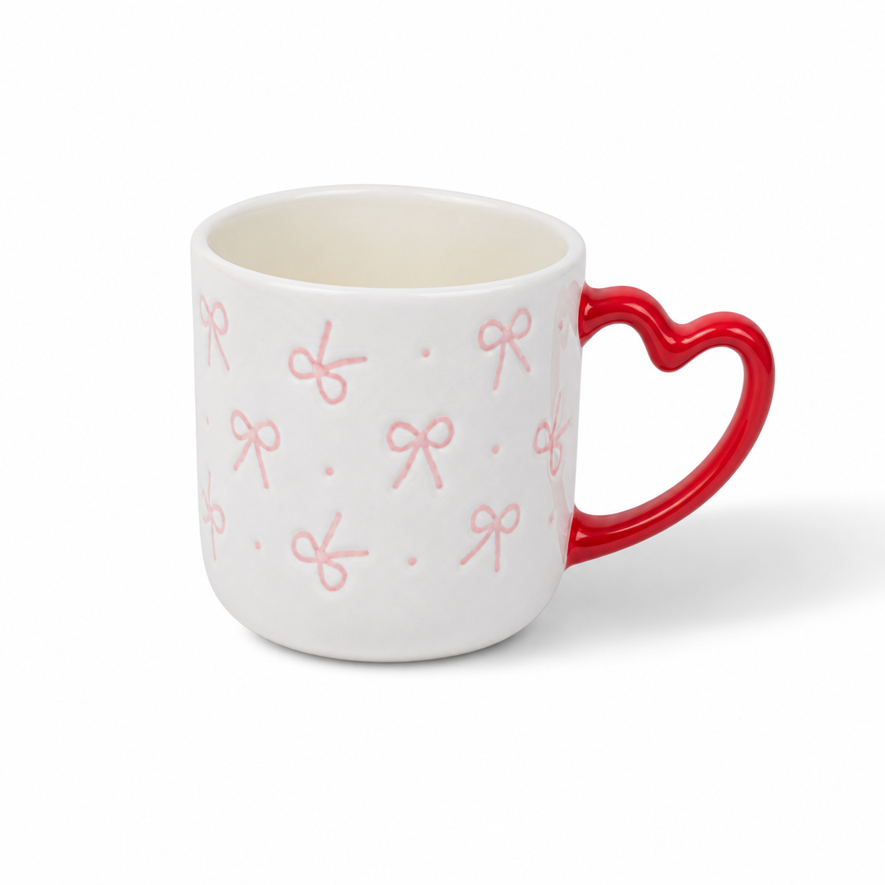 مج بورسلين فيونكة بمقبض قلب – 66 جنيه Bow Porcelain Mug with Heart Handle – 66 LE (2) Bow Porcelain Mug with Heart Handle - Image 1